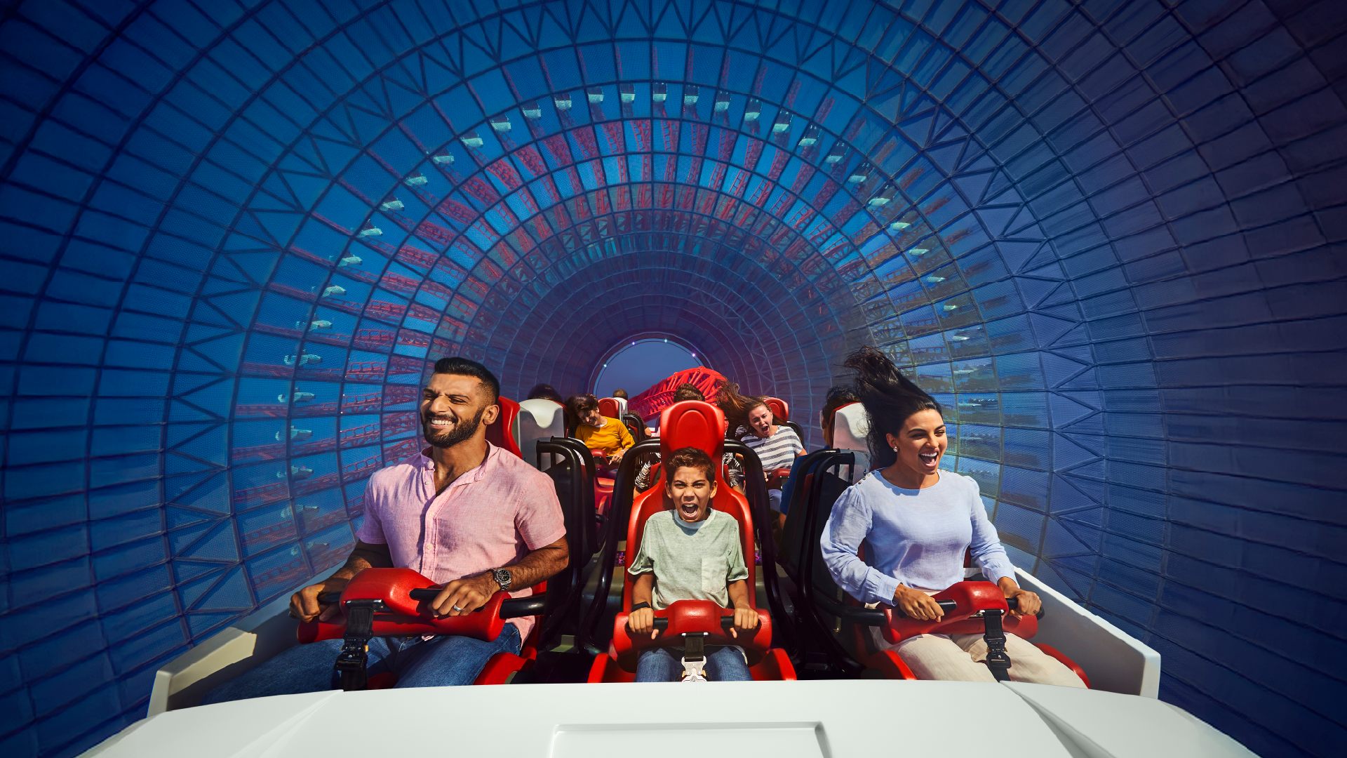 Family riding a roller coaster at Yas Island